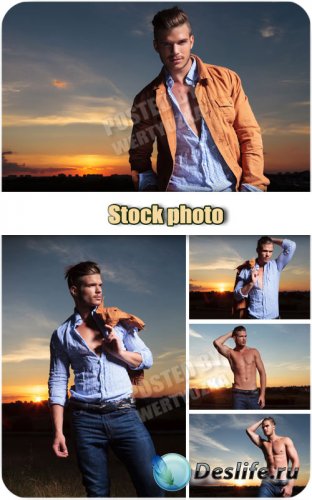      /  Young man at sunset - stock photo