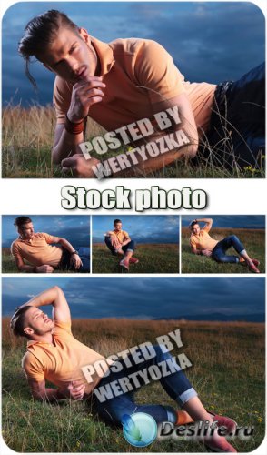     / Man on a green meadow - stock photos