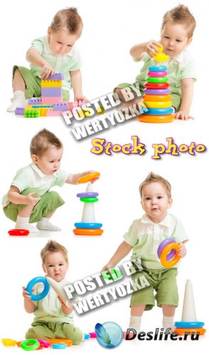      / Kid plays with the pyramid - stock photos