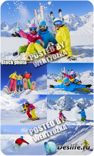      / Family fun at ski resort - stock photo