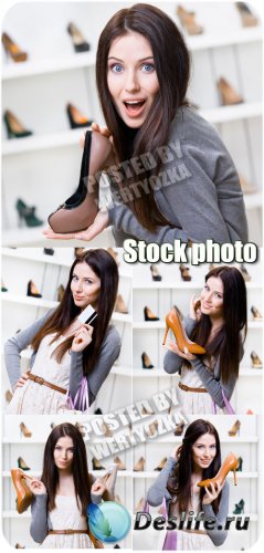     / Girl in a shoe store - stock photos