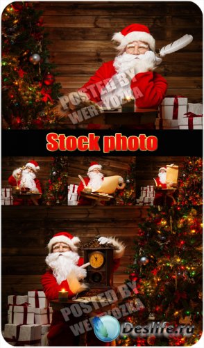      / Santa claus and christmas tree - stock photo