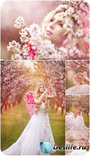 Девушка в цветущем весеннем саду - сток фото