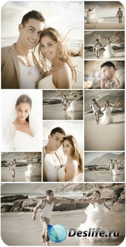 Жених и невеста на морском побережье / Bride and groom at the seaside - Stock photo