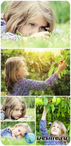     / Little girl with cherries - Stock photo