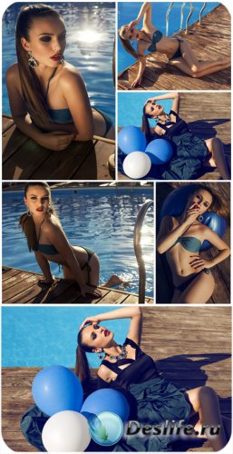       / Girl with balloons at the pool - s ...