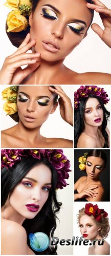       / Beautiful woman with flowers in her hair - Stock Photo