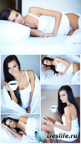      / Beautiful girl with a cup of coffee - Stock Photo